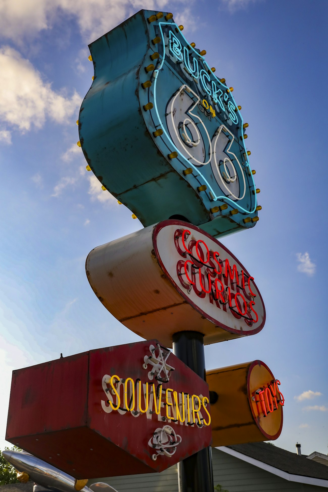 A vintage neon roadside sign on Route 66 in Tulsa